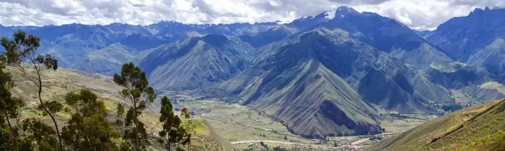 Expansive view of the Andes mountains highlighting the remote communities reached by LUTW’s clean energy work