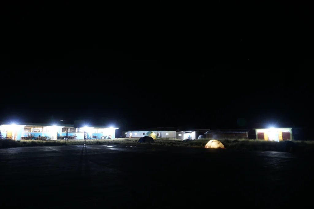 The ccollpapata school lit up at night after the csr solar charity project with NAIT and LUTW in Peru