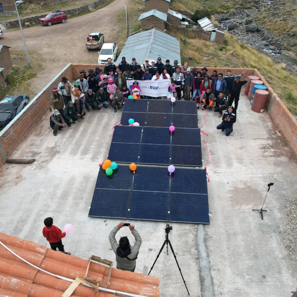 NAIT solar charity project team with the community of santa rosa during the LUTW ceremony